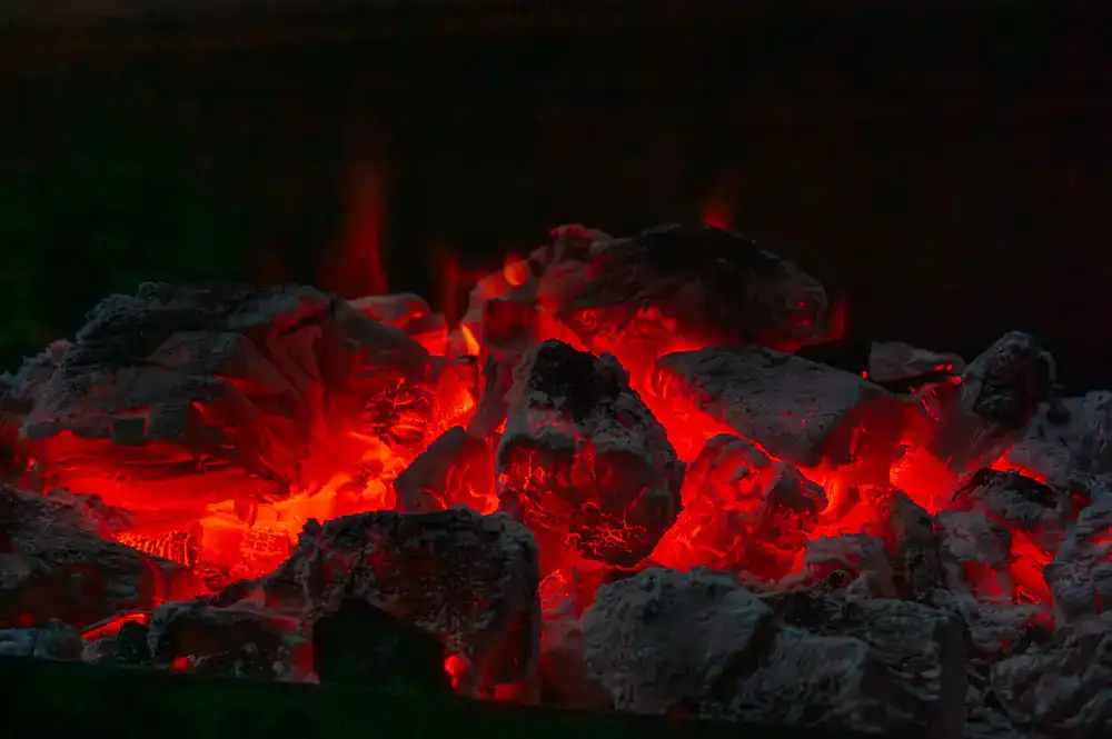 Glowing embers in a dark hostile environment